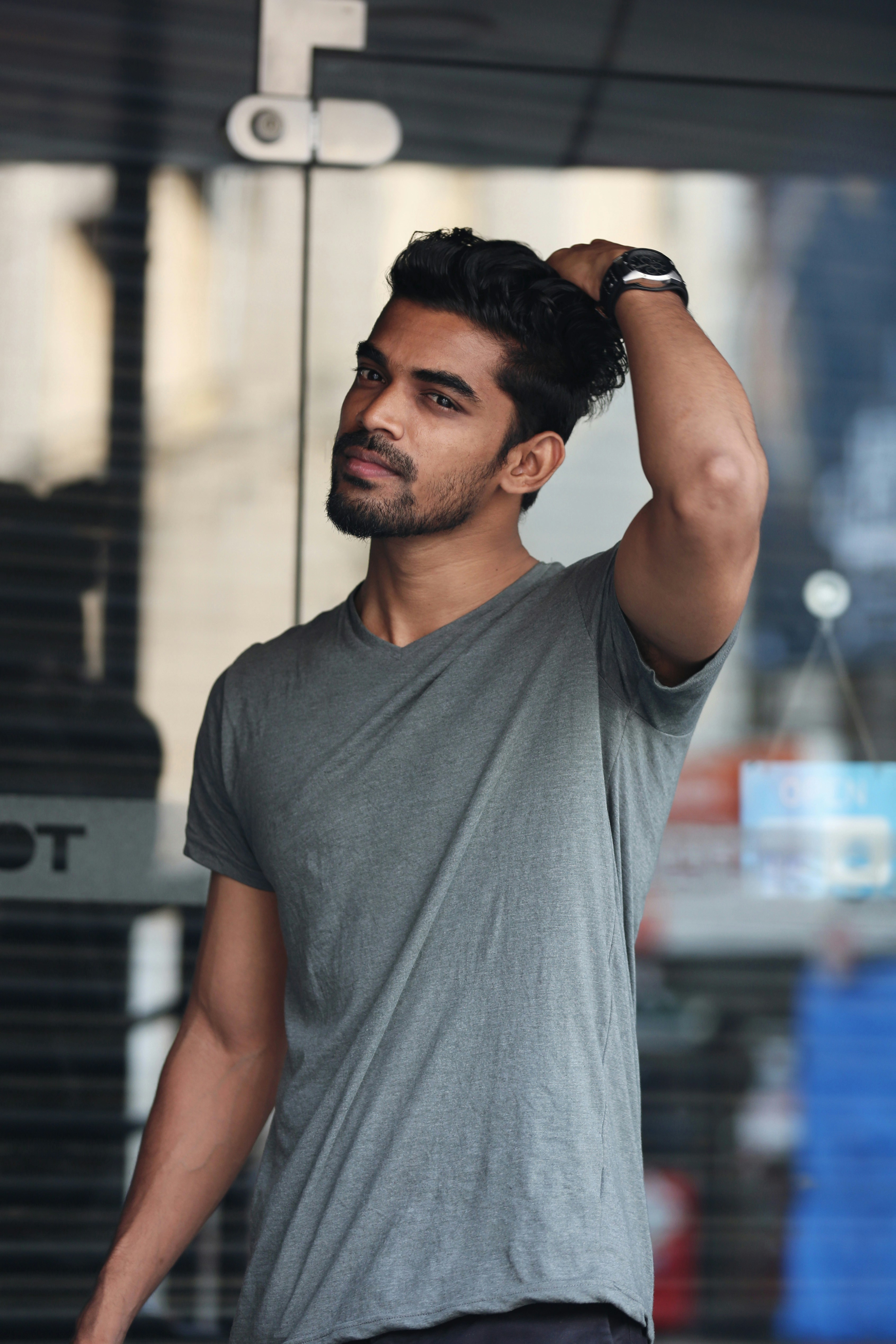 Before: supplied real man model in the original waist-up photograph wearing a grey V-neck T-shirt